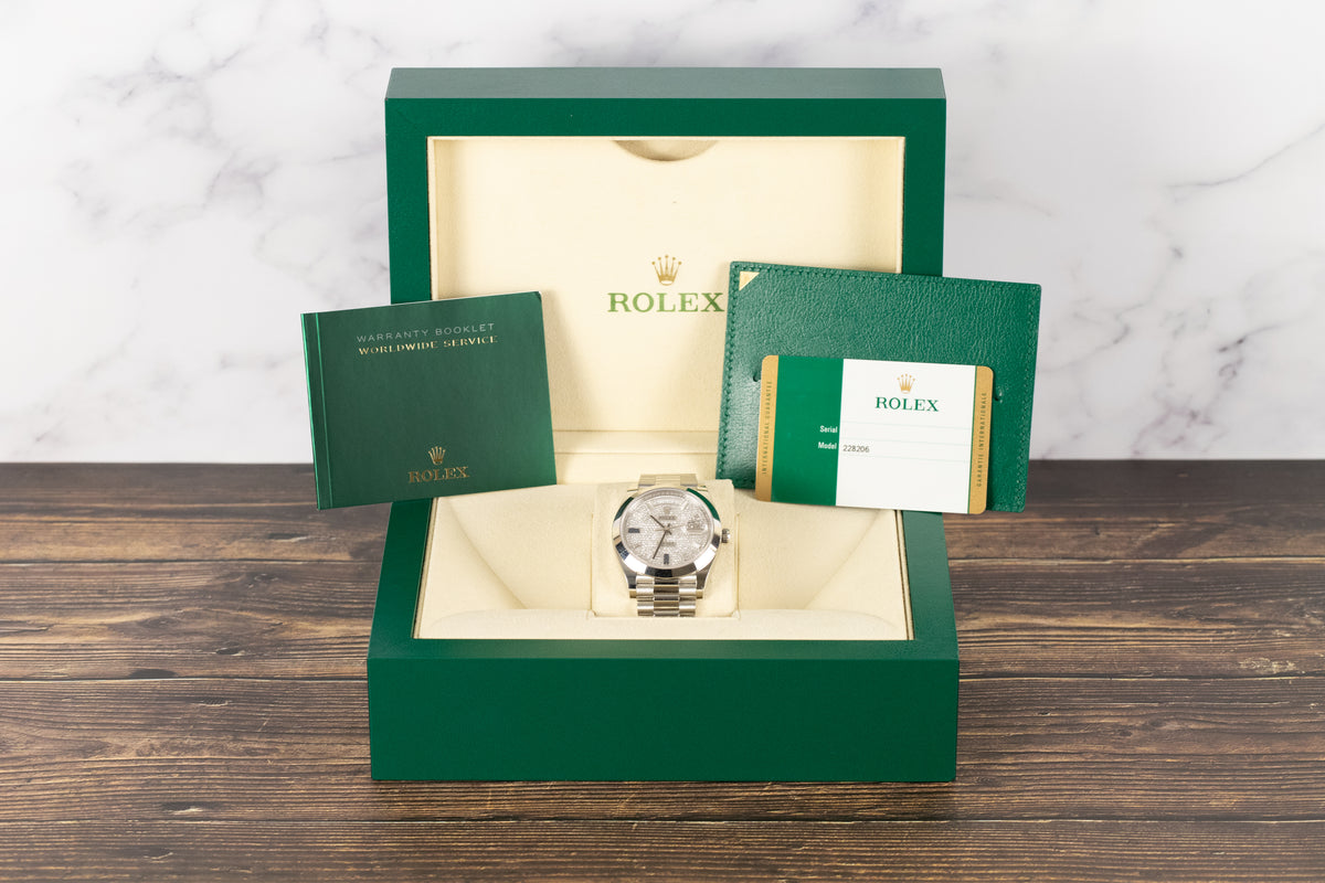 Rolex<br>228206 DayDate 40 Pave Diamond Blue Sapphire Dial