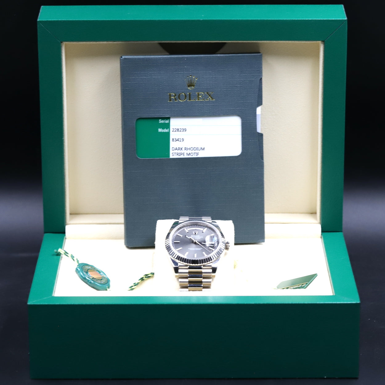 Rolex<br>228239 DayDate 40 Dark Rhodium Stripe Motif Dial