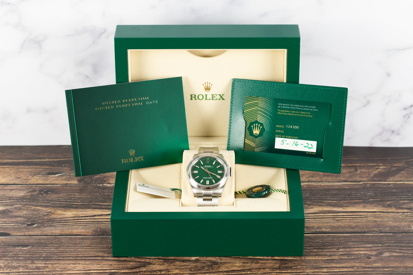 Rolex<br>124300 Oyster Perpetual 41mm Green Dial