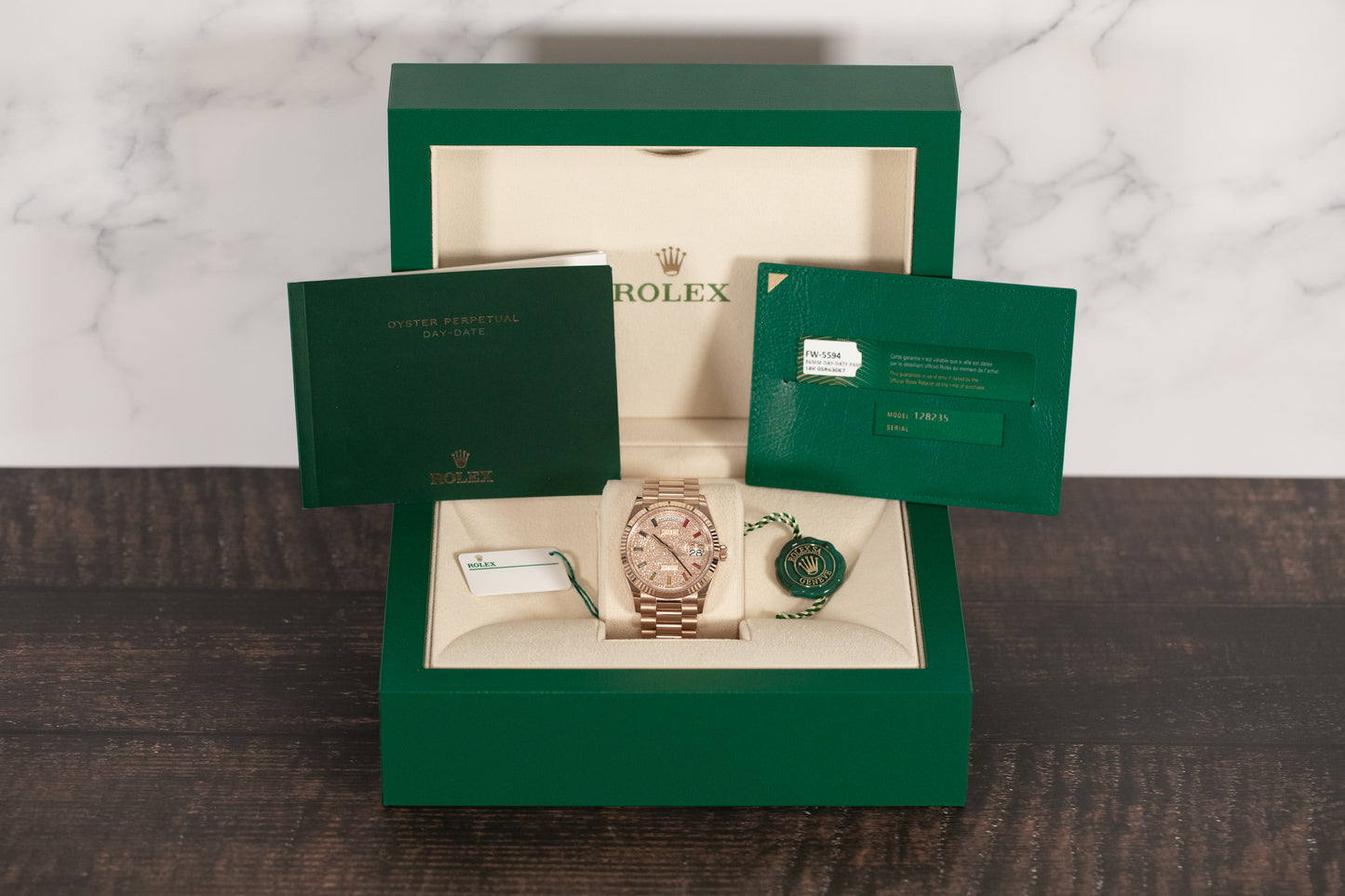 Rolex<br>128235 Day-Date 36 Pave Rainbow Dial