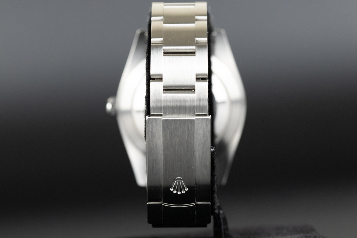 Rolex<br>124300 Oyster Perpetual 41mm Green Dial