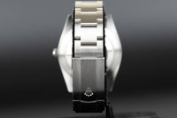Rolex<br>124300 Oyster Perpetual 41mm Green Dial
