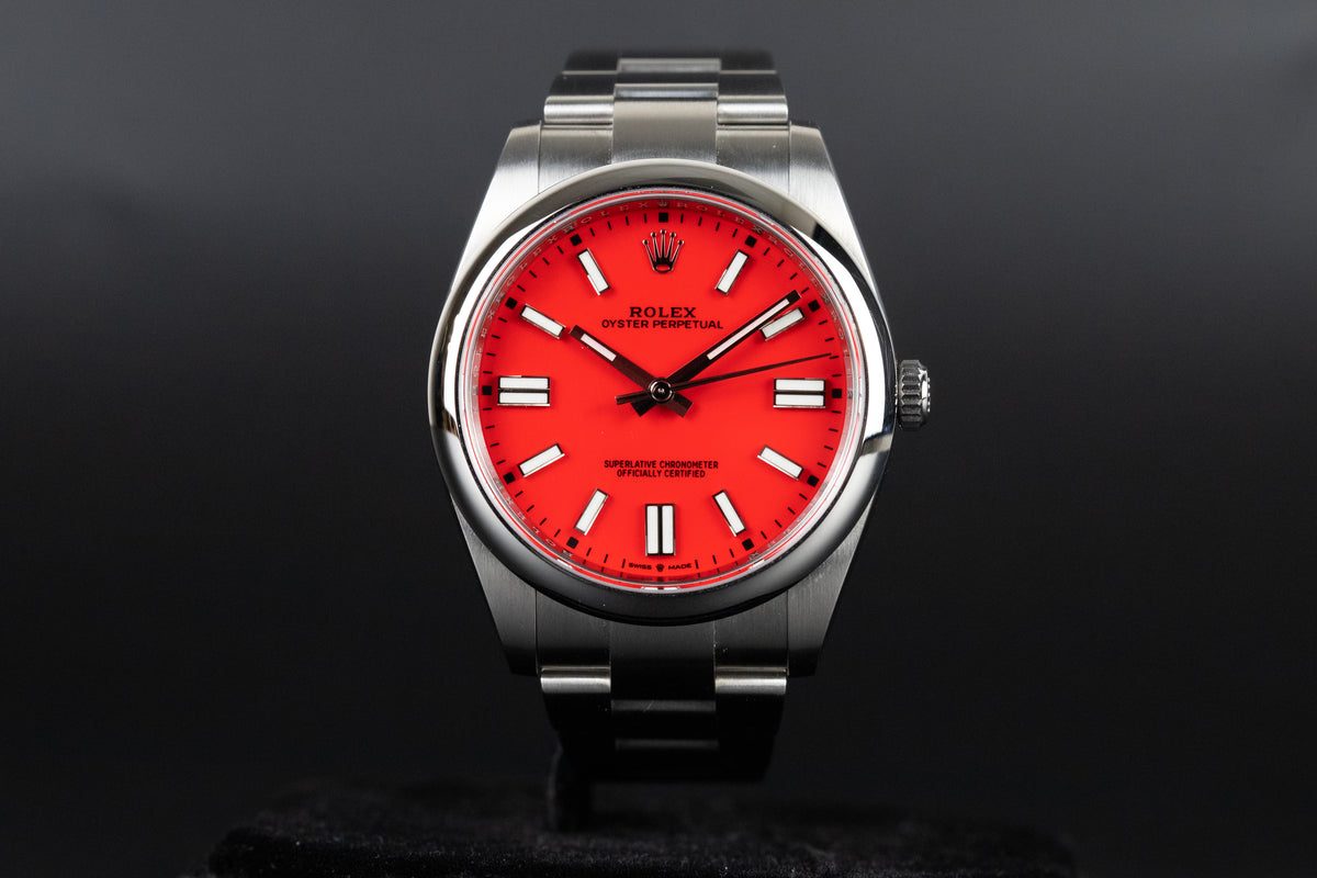 Rolex<br>124300 Oyster Perpetual 41mm Coral Red Dial