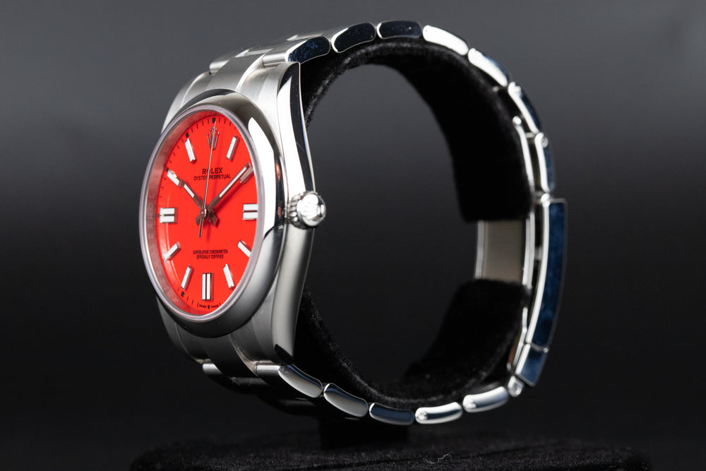 Rolex<br>124300 Oyster Perpetual 41mm Coral Red Dial