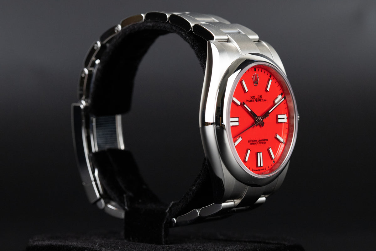 Rolex<br>124300 Oyster Perpetual 41mm Coral Red Dial