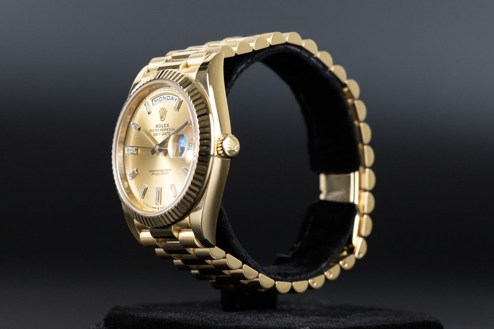 Rolex<br>228238 DayDate 40 Champagne Baguette Diamond Dial