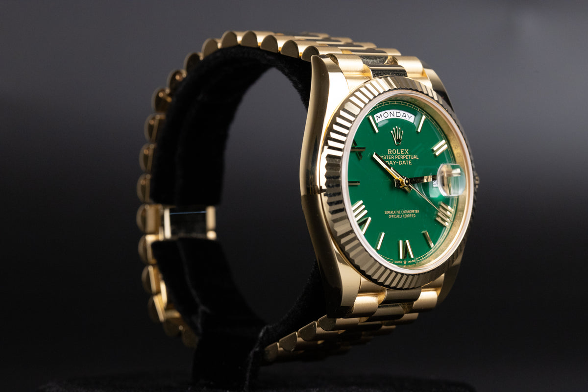 Rolex<br>228238 DayDate 40 Green Roman Numeral Dial