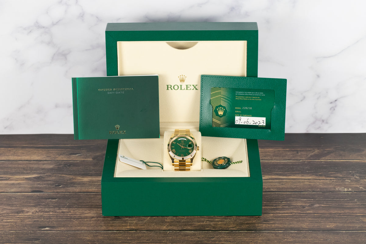 Rolex<br>228238 DayDate 40 Green Roman Numeral Dial