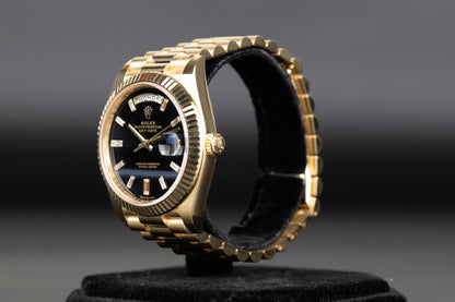 Rolex 228238 DayDate 40 Baguette Diamond Black Onyx Dial