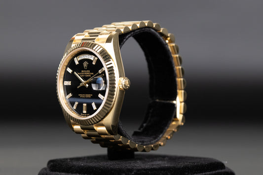 Rolex 228238 DayDate 40 Baguette Diamond Black Onyx Dial