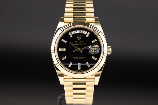Rolex 228238 DayDate 40 Baguette Diamond Black Onyx Dial