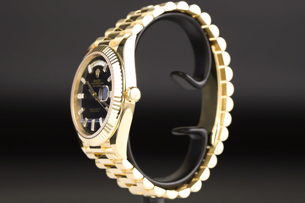 Rolex<br>228238 DayDate 40 Baguette Diamond Black Onyx Dial