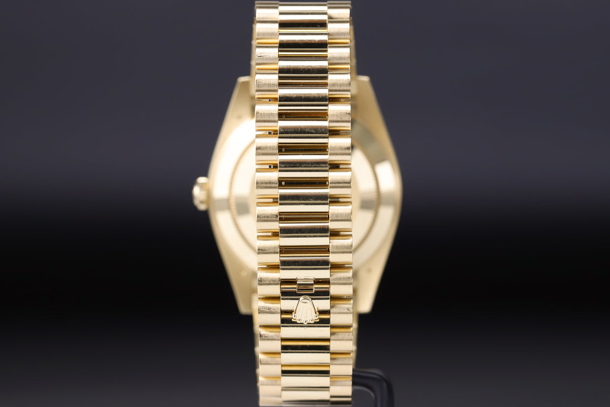Rolex<br>228238 DayDate 40 Baguette Diamond Black Onyx Dial