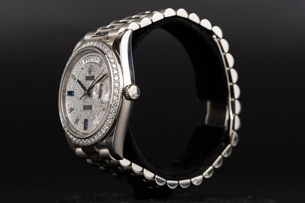 Rolex<br>228349RBR DayDate 40 White Gold Diamond Bezel Pave Sapphire Dial