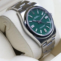 Rolex<br>124300 Oyster Perpetual 41mm Green Dial