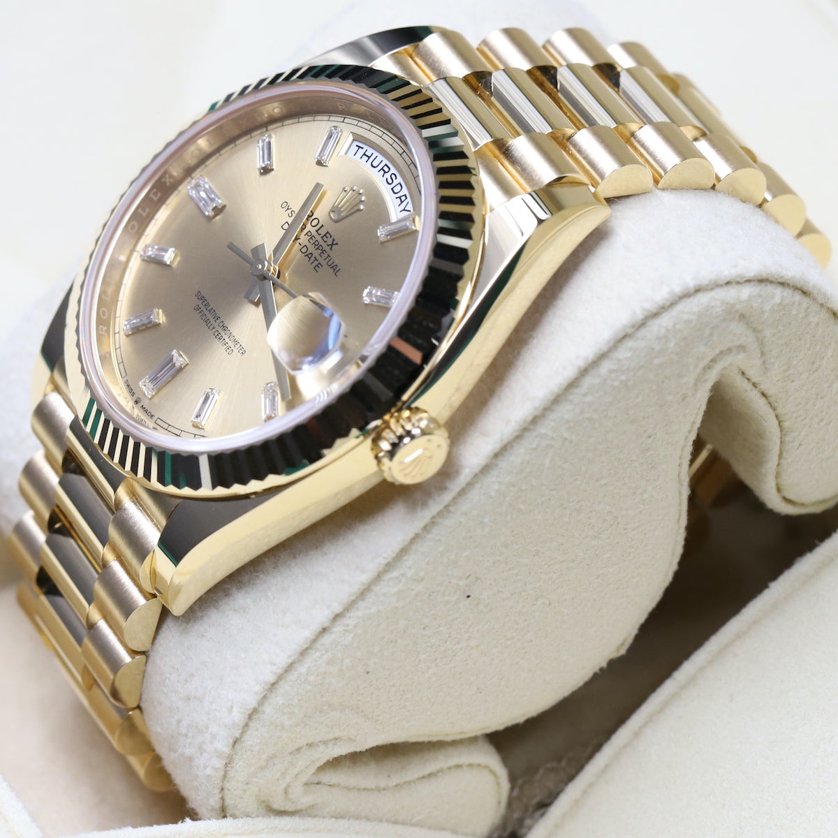 Rolex<br>228238 DayDate 40 Champagne Baguette Diamond Dial