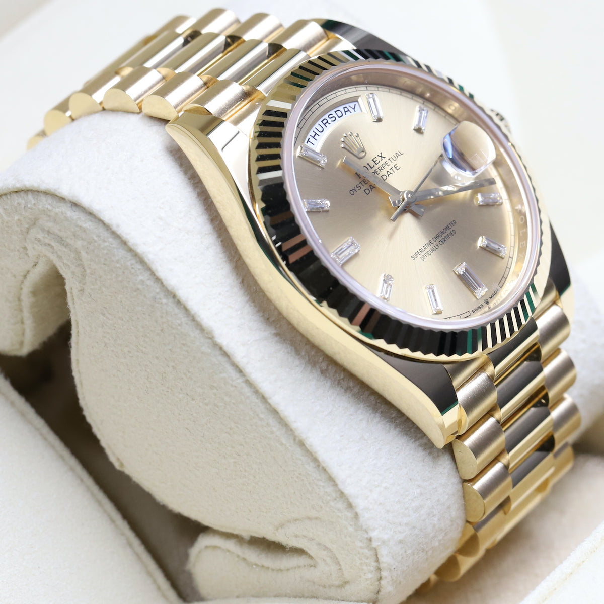 Rolex<br>228238 DayDate 40 Champagne Baguette Diamond Dial