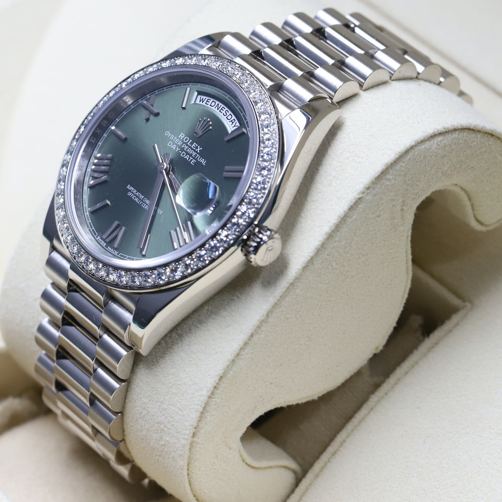 Rolex<br>228349RBR DayDate 40 White Gold Diamond Bezel Green Dial