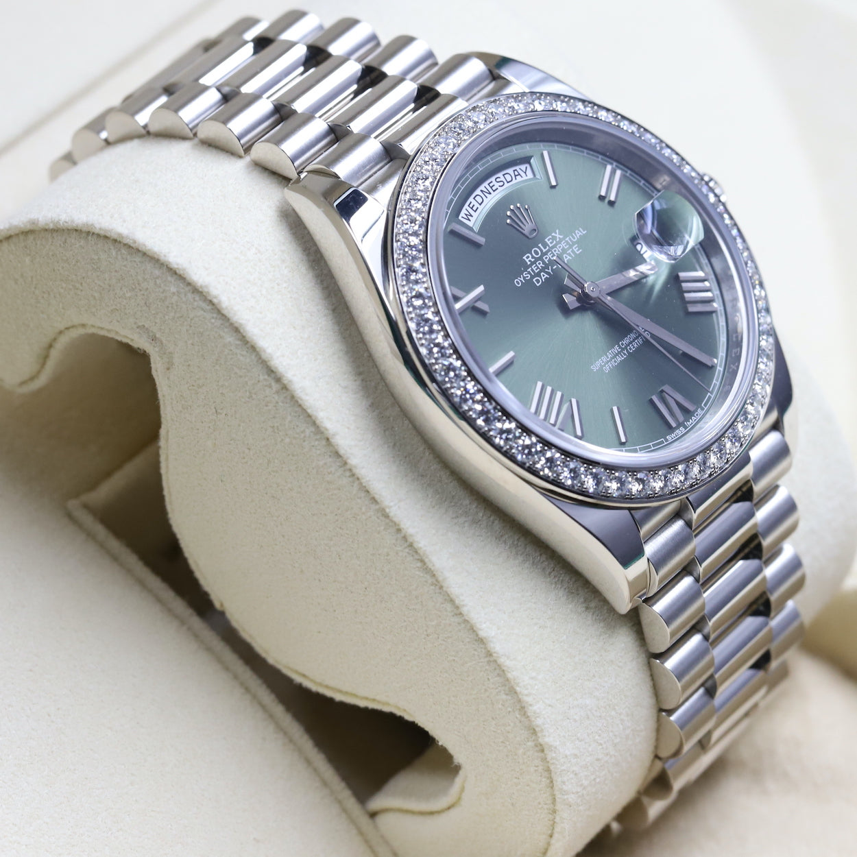 Rolex<br>228349RBR DayDate 40 White Gold Diamond Bezel Green Dial