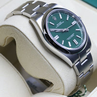 Rolex<br>124300 Oyster Perpetual 41mm Green Dial