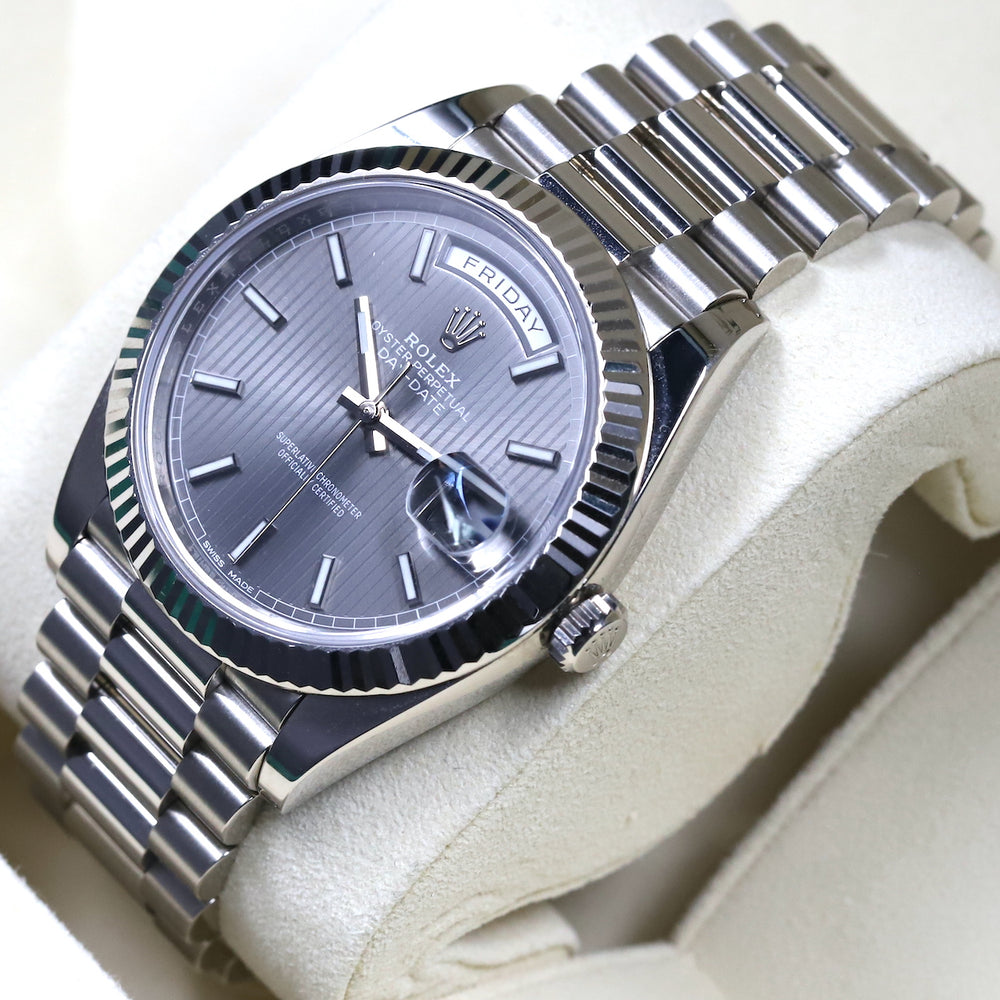 Rolex<br>228239 DayDate 40 Dark Rhodium Stripe Motif Dial