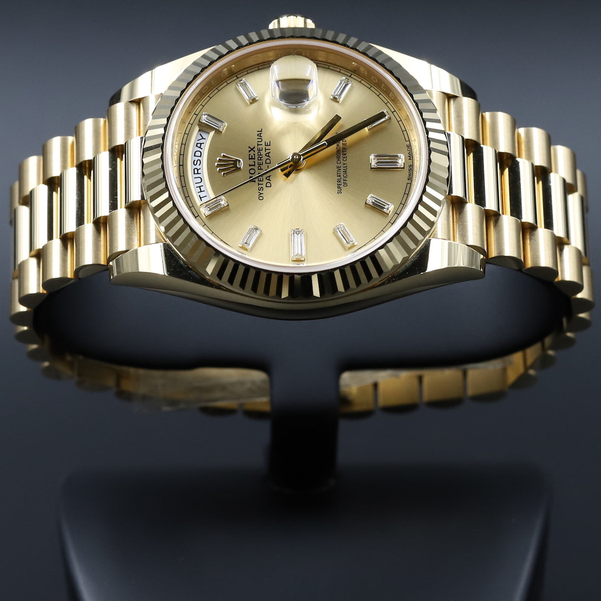 Rolex<br>228238 DayDate 40 Champagne Baguette Diamond Dial