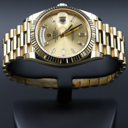 Rolex<br>228238 DayDate 40 Champagne Baguette Diamond Dial