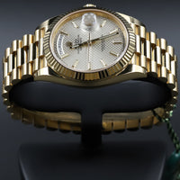 Rolex<br>228238 DayDate 40 Silver Diagonal Motif Dial