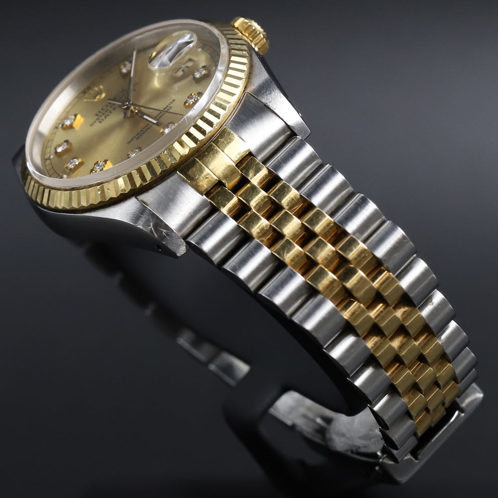 Rolex<br>16233 Datejust 36 SS/18k Champagne Diamond Dial