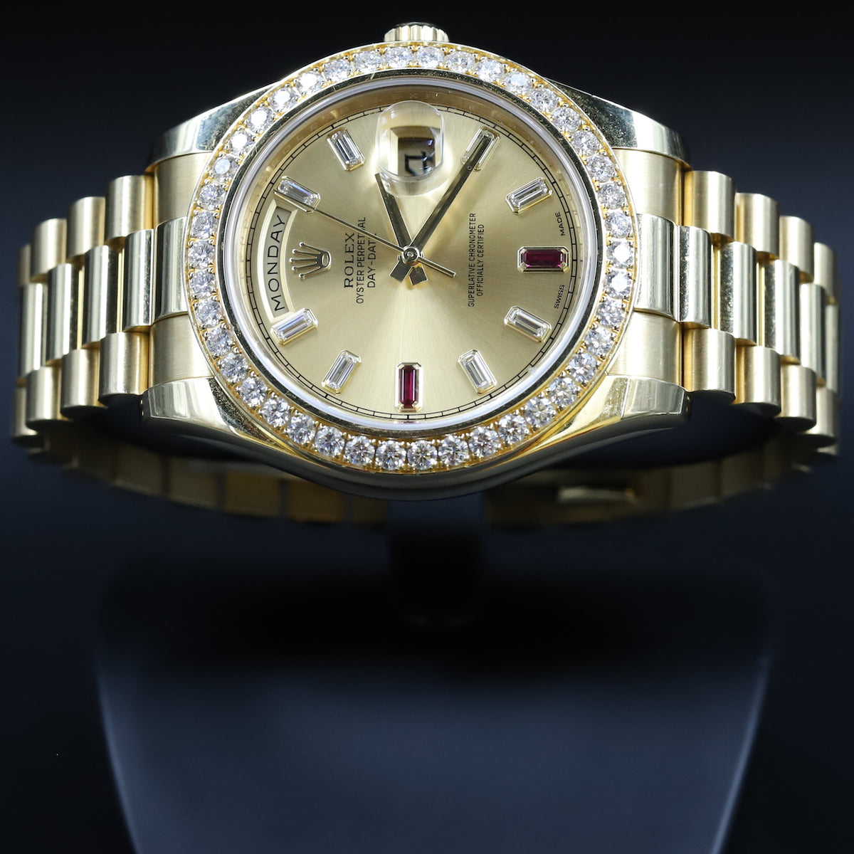 Rolex<br>218348 DayDate II Ruby Dial Diamond Bezel