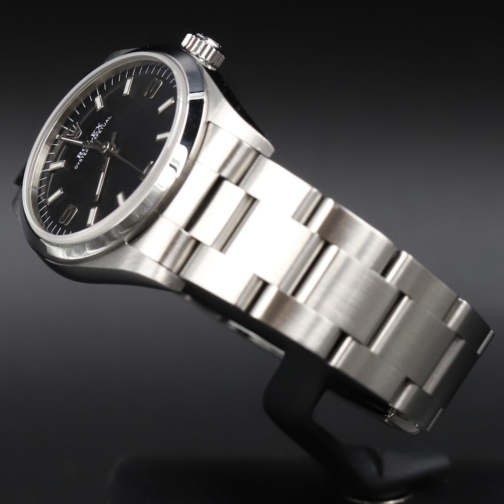 Rolex<br>77080 Oyster Perpetual 31 Black Dial