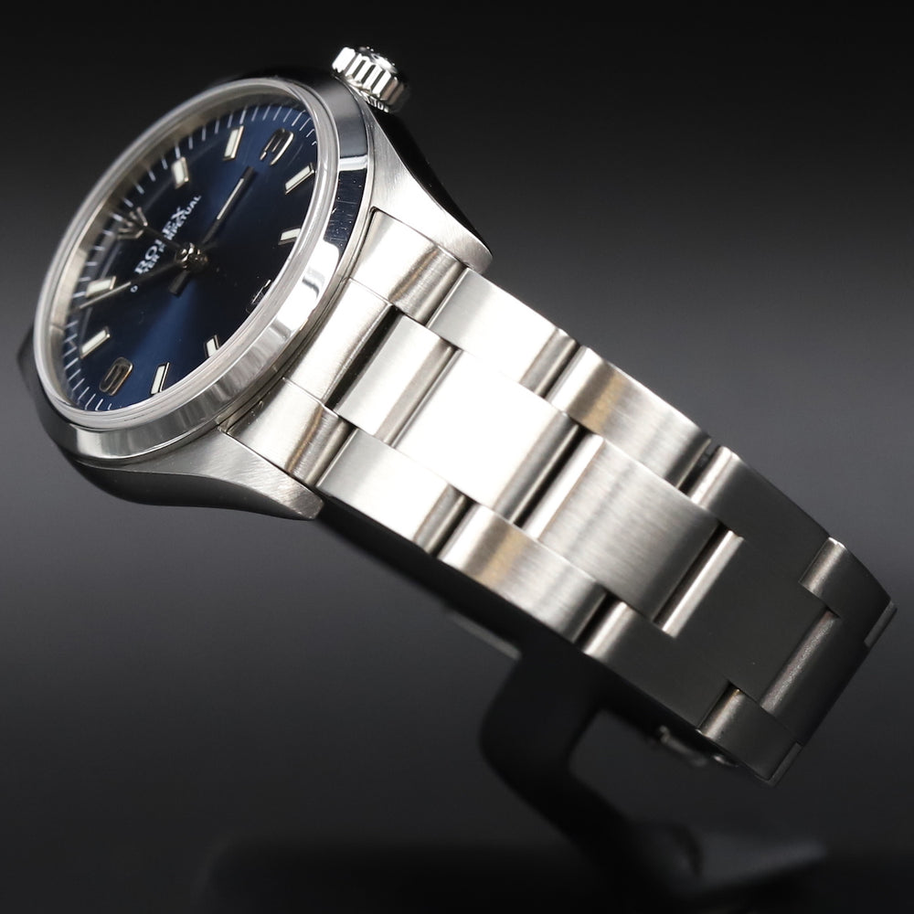 Rolex<br>77080 Oyster Perpetual 31 Blue Dial