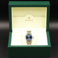 Rolex<br>77080 Oyster Perpetual 31 Blue Dial