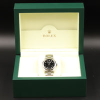 Rolex<br>77080 Oyster Perpetual 31 Black Dial