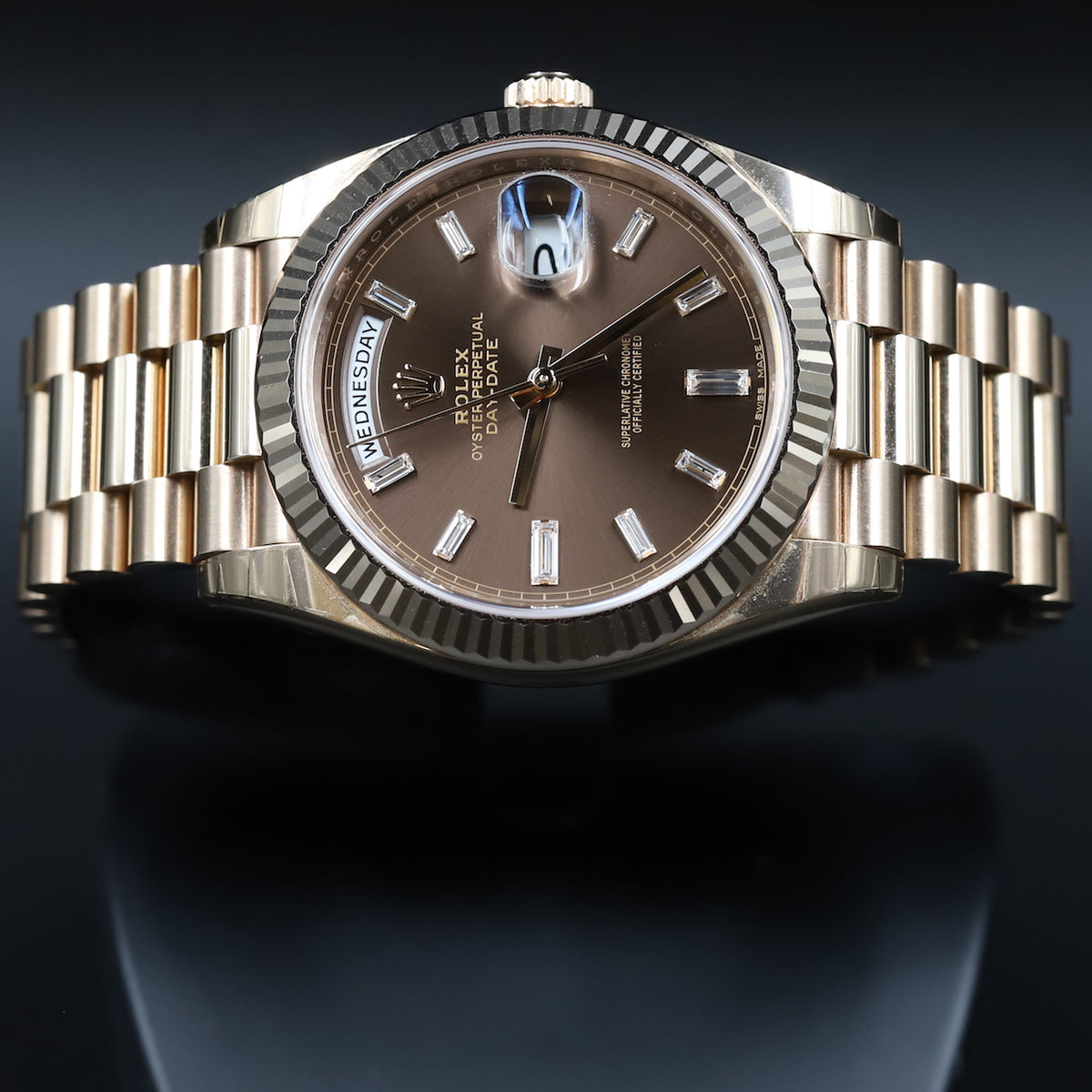 Rolex<br>228235 DayDate 40 Chocolate Baguette Diamond Dial