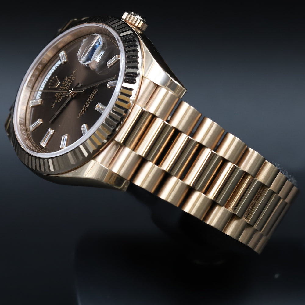 Rolex<br>228235 DayDate 40 Chocolate Baguette Diamond Dial