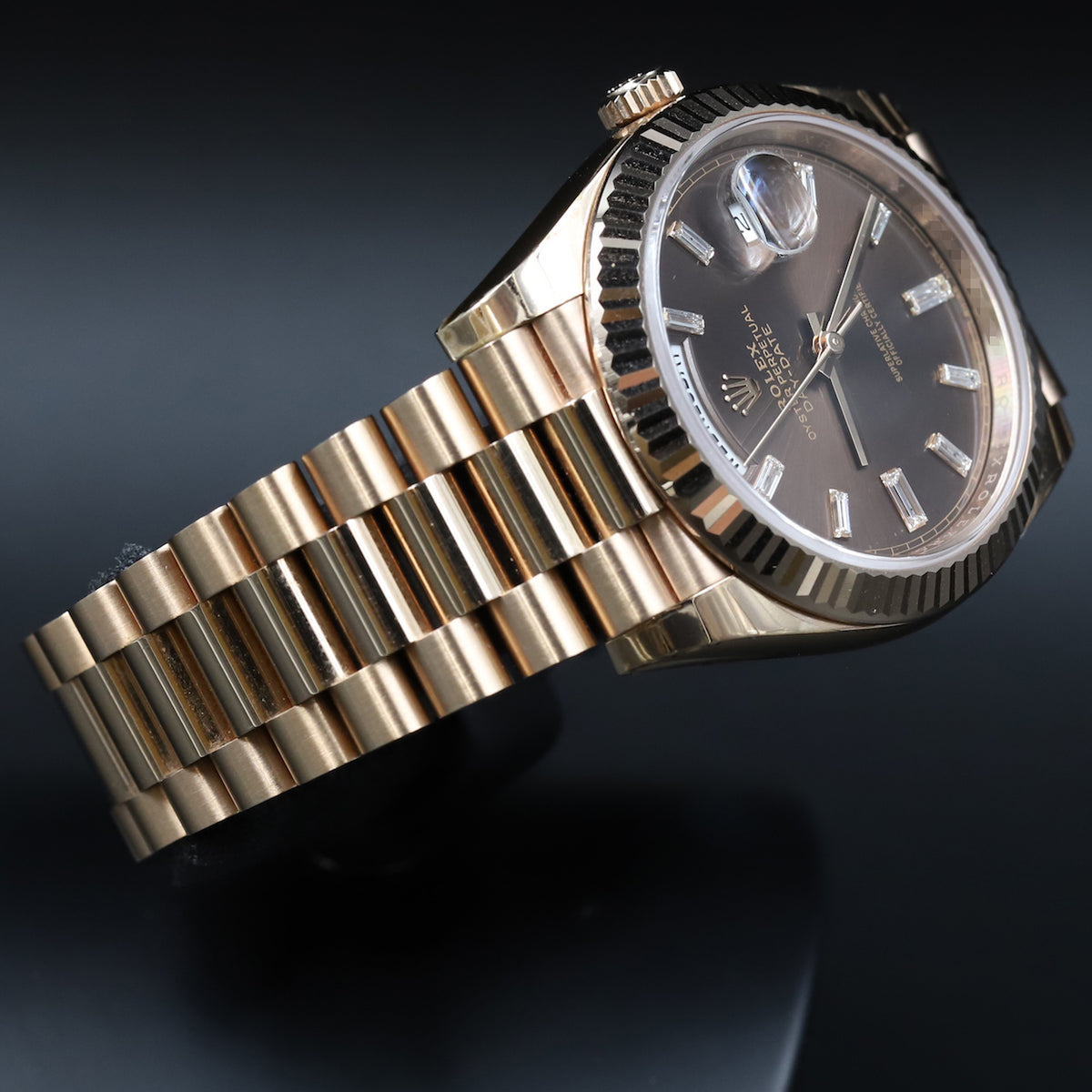 Rolex<br>228235 DayDate 40 Chocolate Baguette Diamond Dial