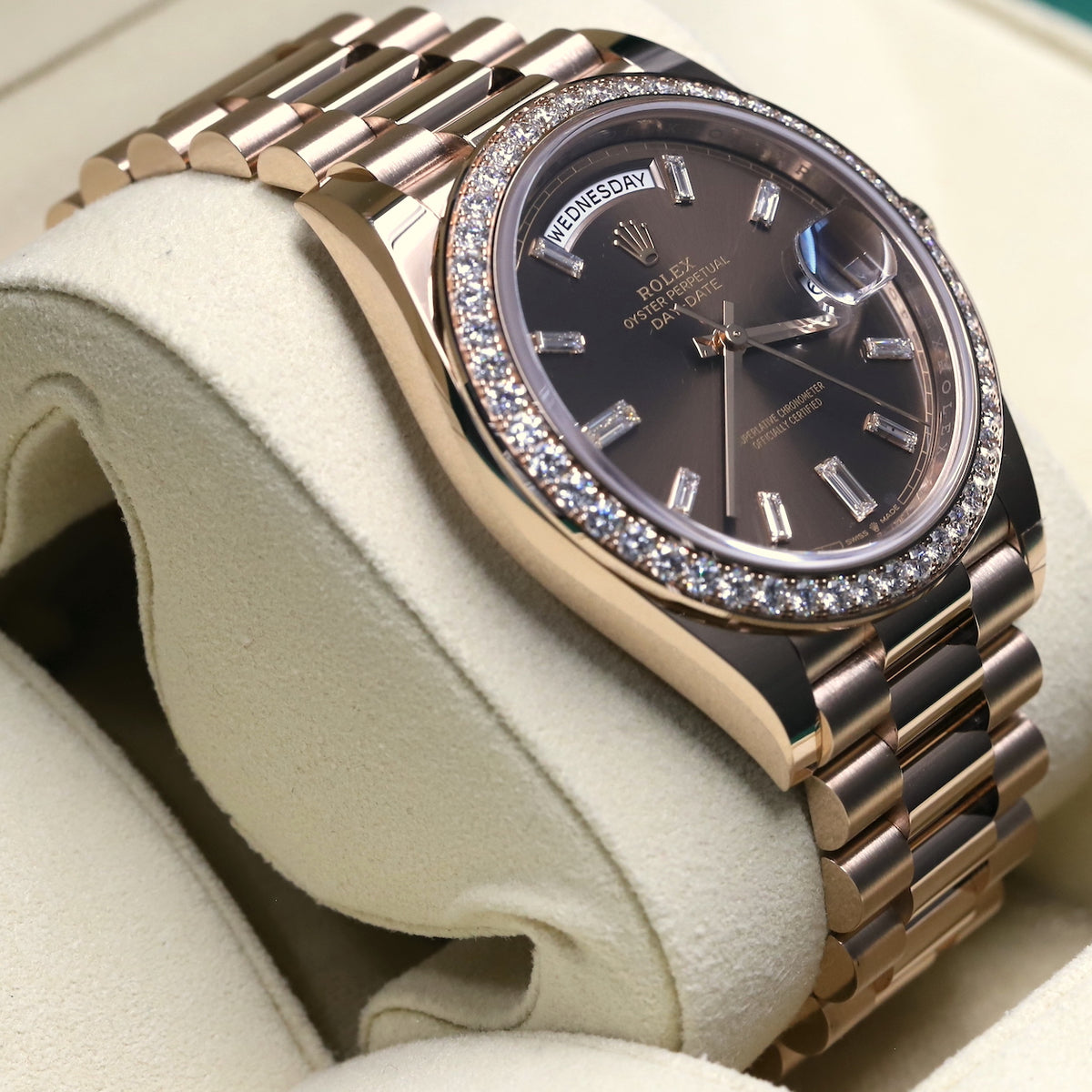 Rolex<br>228345RBR DayDate 40 Rose Gold Baguette Diamond Dial Diamond Bezel