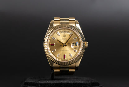 Rolex 218238 DayDate II Champagne Ruby Dial