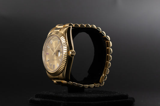 Rolex 218238 DayDate II Champagne Ruby Dial