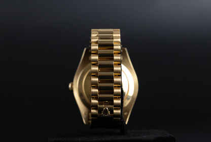 Rolex 218238 DayDate II Champagne Ruby Dial