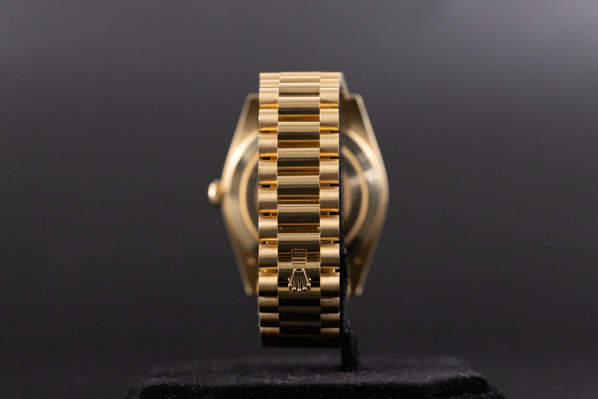 Rolex<br>228238 DayDate 40 Champagne Index Dial