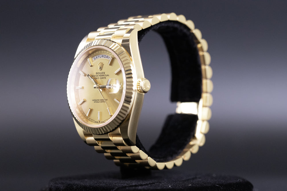 Rolex<br>228238 DayDate 40 Champagne Index Dial