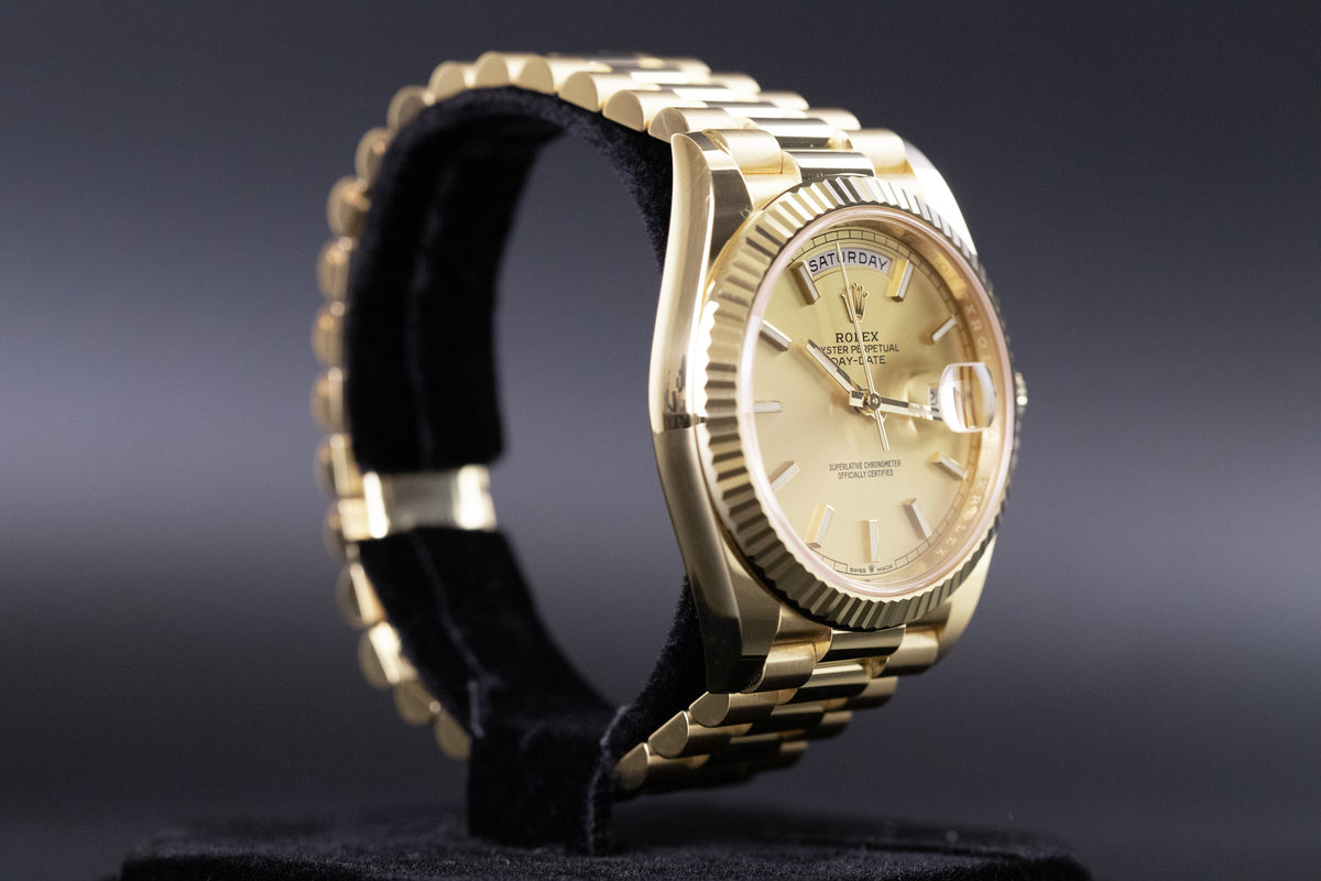 Rolex<br>228238 DayDate 40 Champagne Index Dial