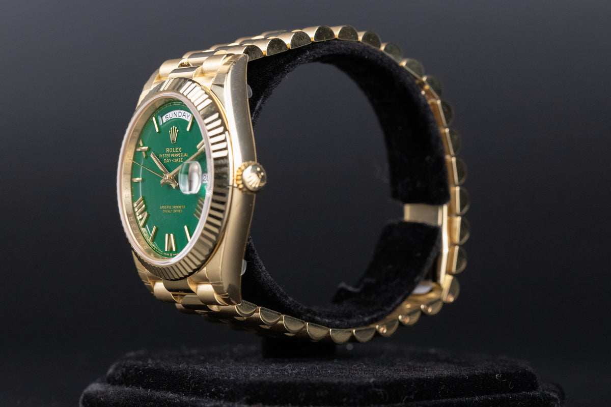 Rolex<br>228238 DayDate 40 Green Roman Numeral Dial