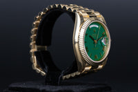 Rolex<br>228238 DayDate 40 Green Roman Numeral Dial