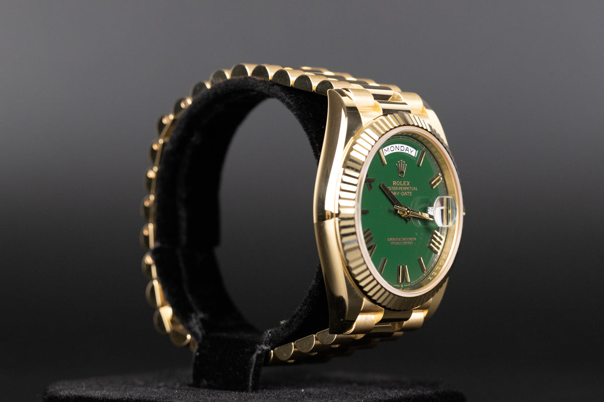 Rolex<br>228238 DayDate 40 Green Roman Numeral Dial