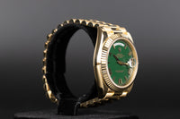 Rolex<br>228238 DayDate 40 Green Roman Numeral Dial