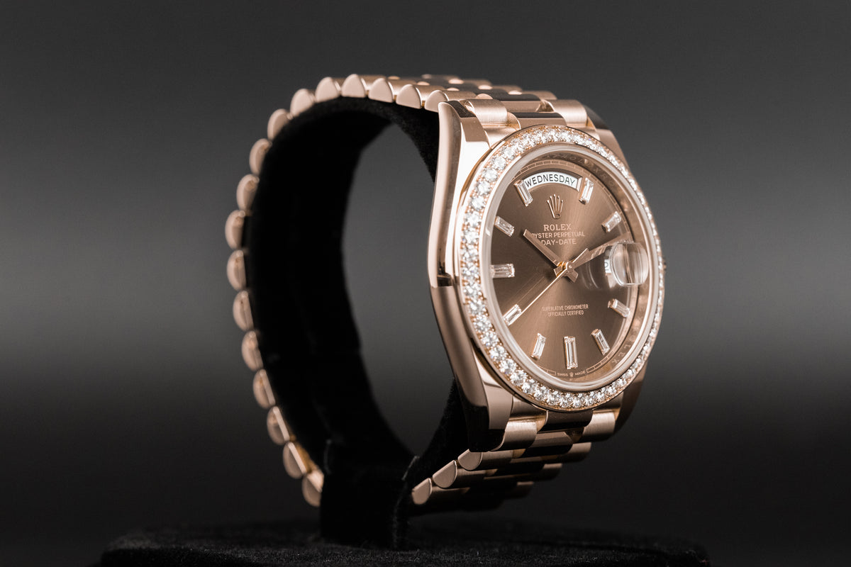 Rolex<br>228345RBR DayDate 40 Rose Gold Baguette Diamond Dial Diamond Bezel