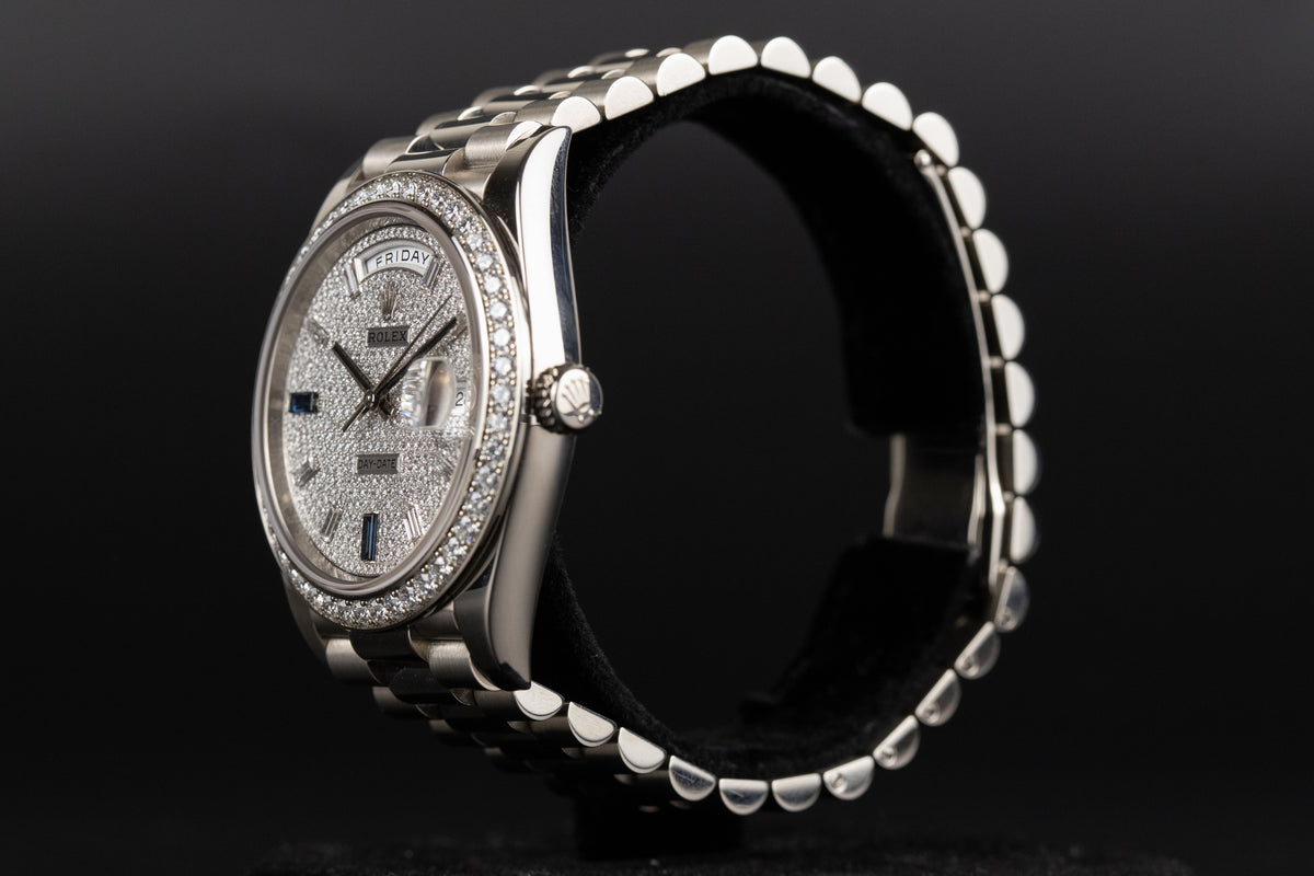 Rolex<br>228349RBR DayDate 40 White Gold Diamond Bezel Pave Sapphire Dial